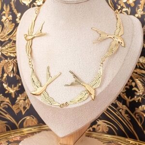 ANTHROPOLOGIE GOLDEN DOVE NECKLACE